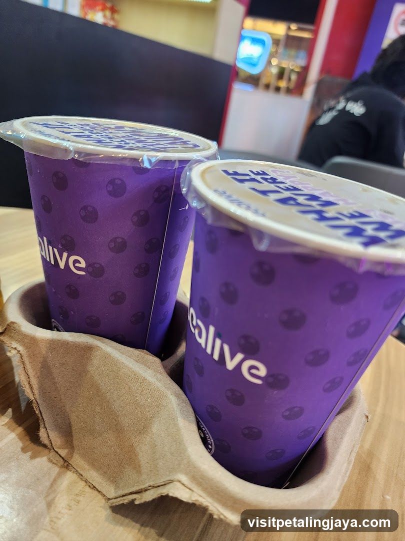 Purple cups in a cardboard holder