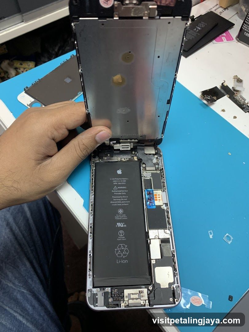 Disassembled iPhone on Workbench