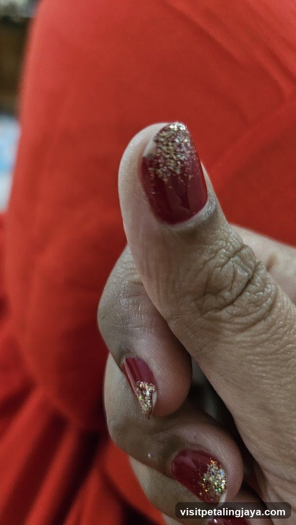Red Nail Art with Gold Glitter