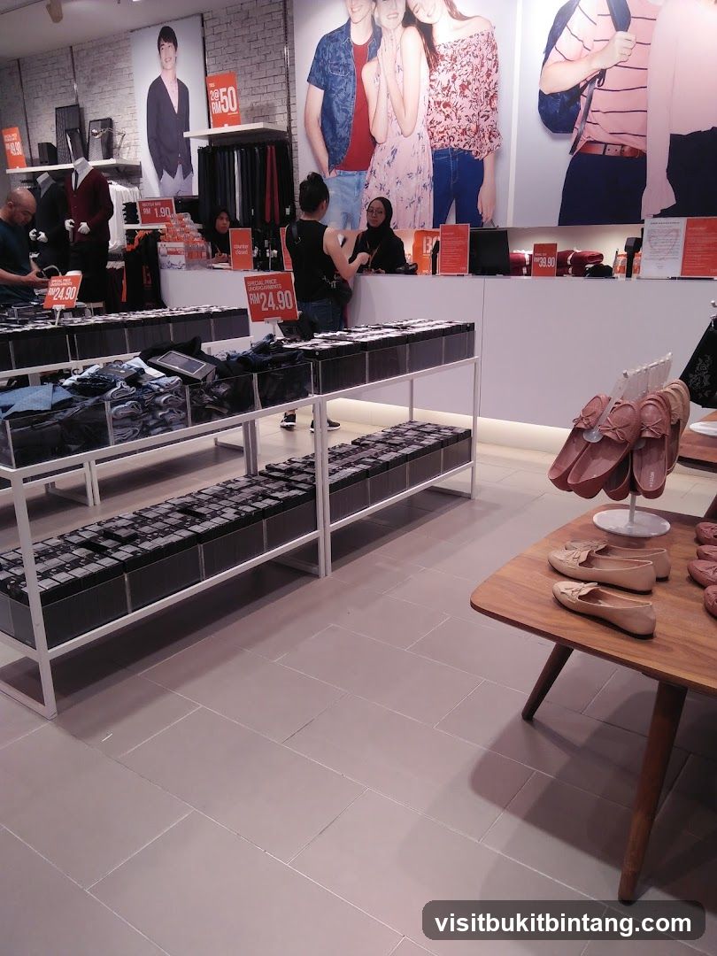 Clothing store interior with sale signs