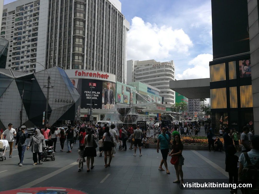 Busy street with shops and people