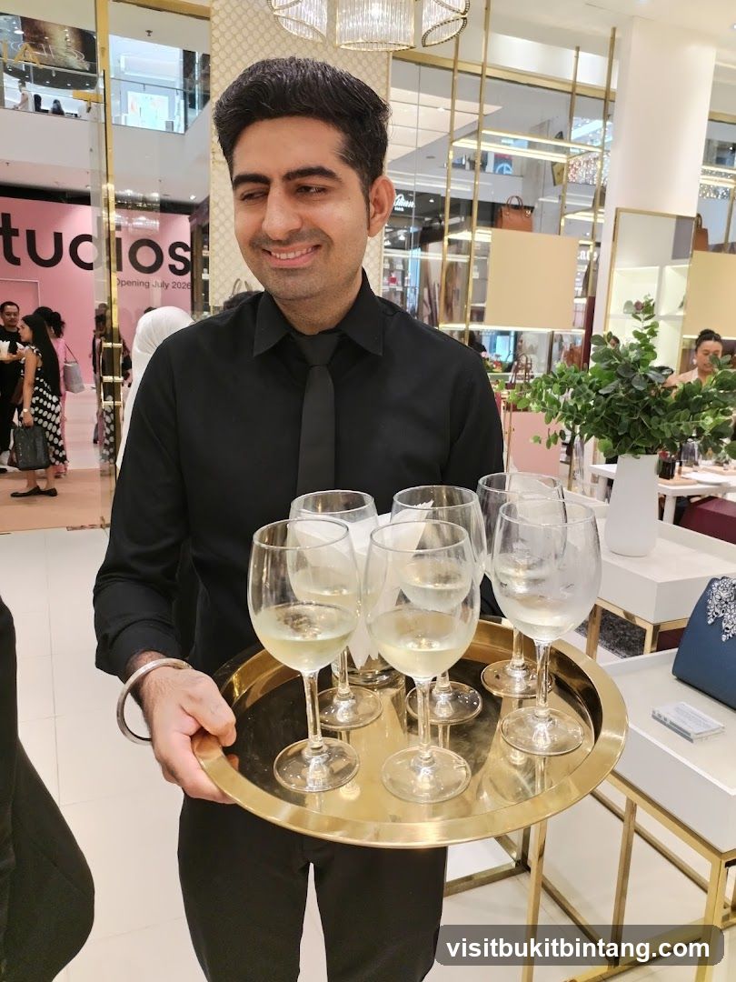 Waiter offering drinks