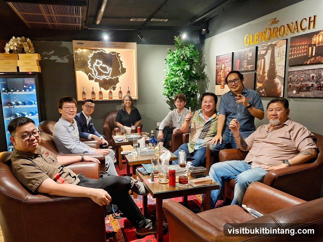 People enjoying cigars and drinks in a lounge