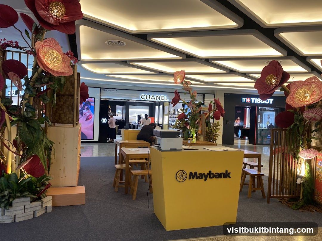 Maybank Booth with Chanel and Tissot Stores in Background