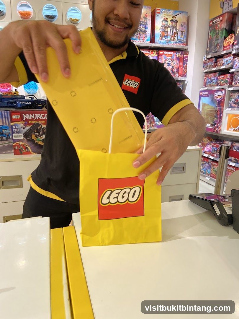 Lego Store Employee Packing a Bag