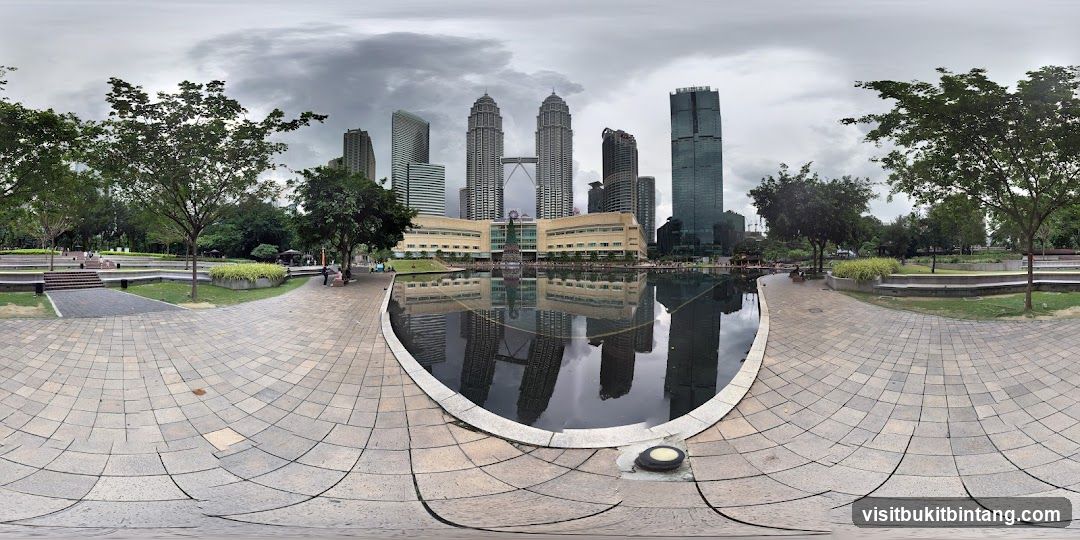 Park with city skyline reflection