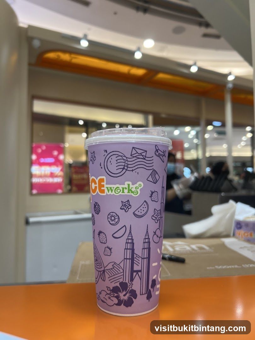 Juice Cup with Cityscape and Fruit Design