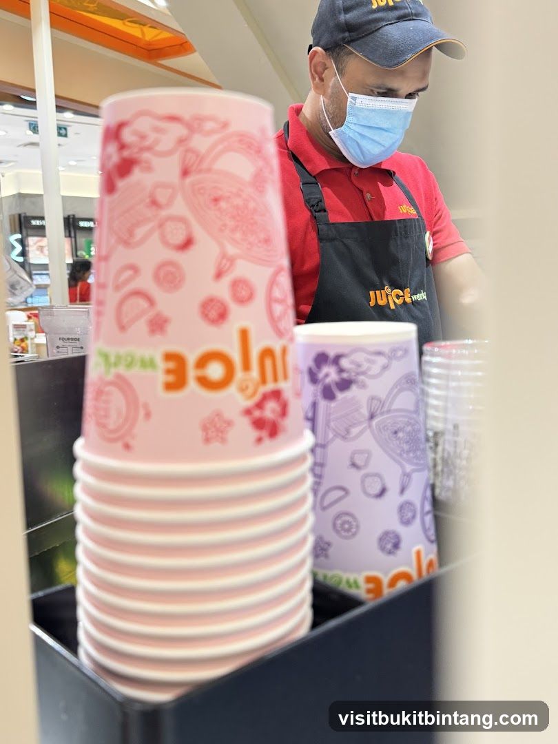Juice World Staff Preparing Drinks