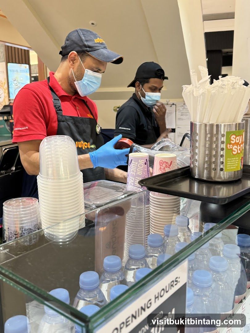 Juice Bar Staff Preparing Drinks