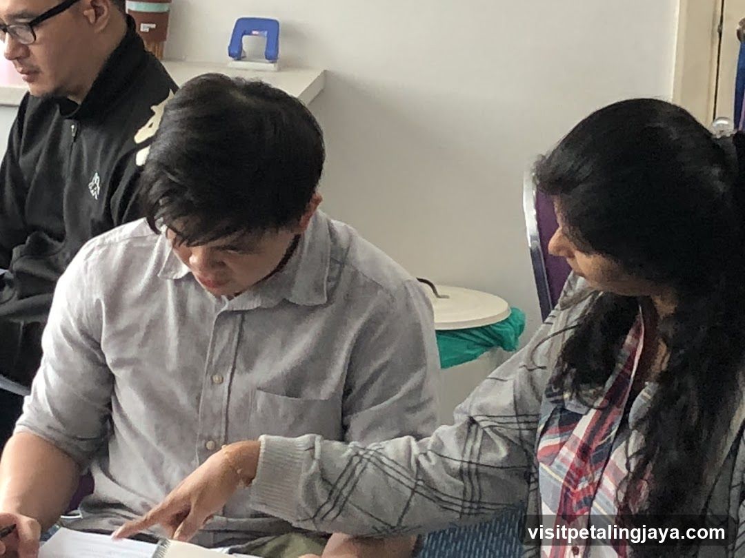 People reviewing documents indoors