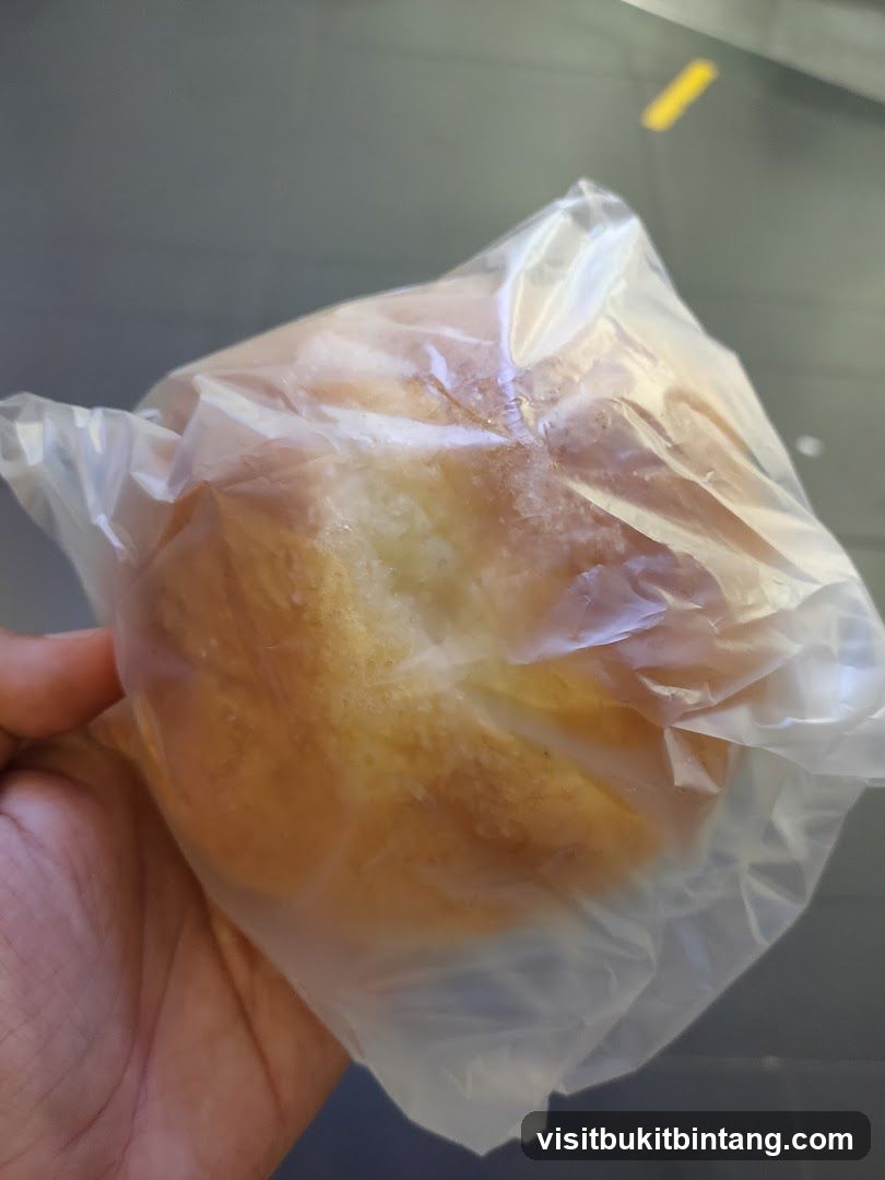 Bread roll in plastic bag