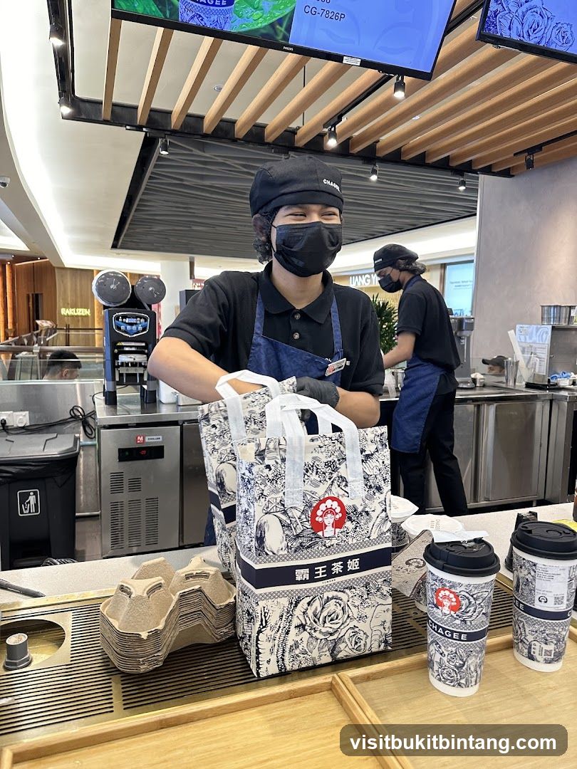 Tea Shop Staff with Merchandise