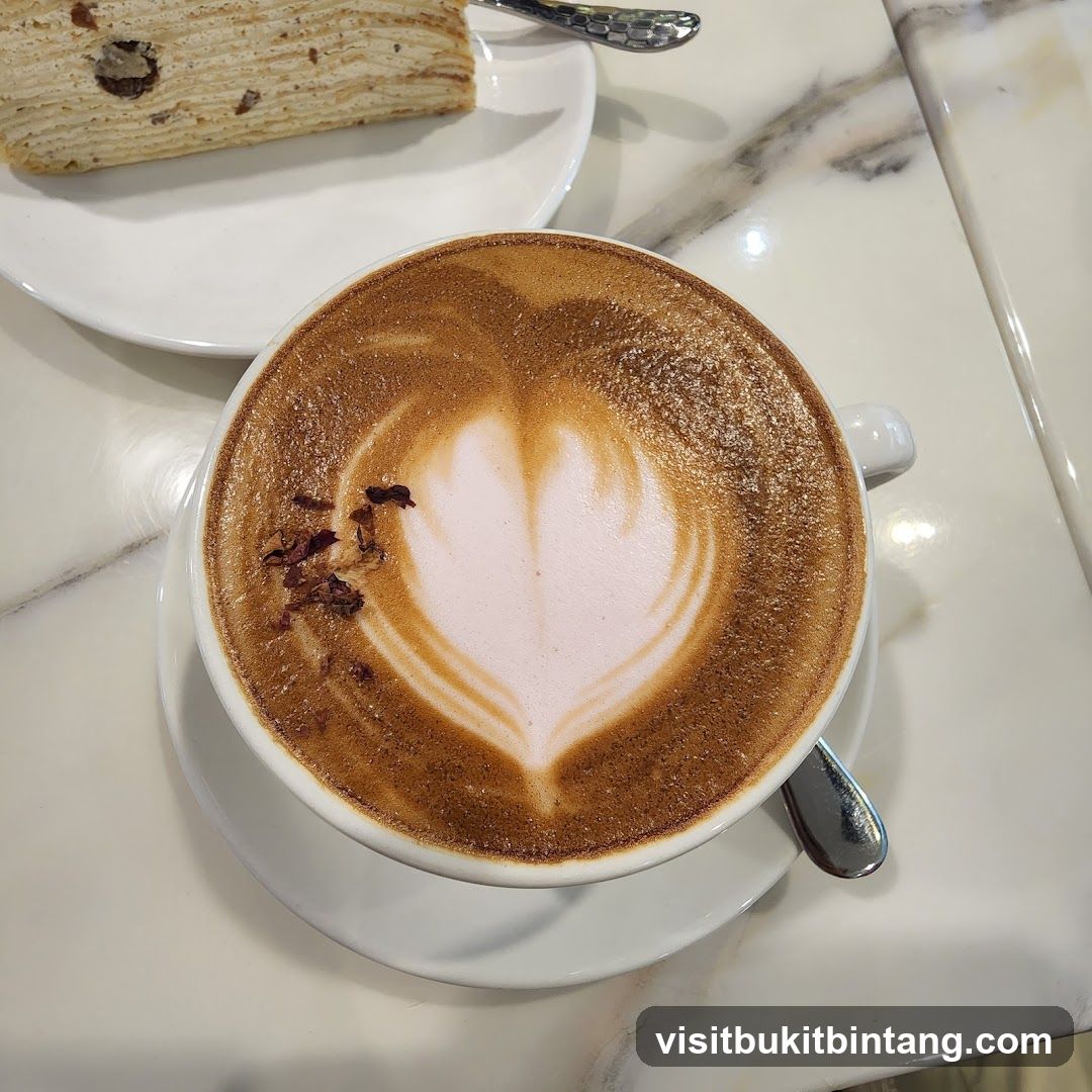 Latte with Heart Art and Cake