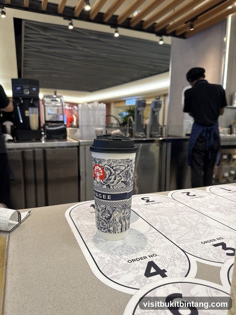 Coffee cup on counter with order numbers
