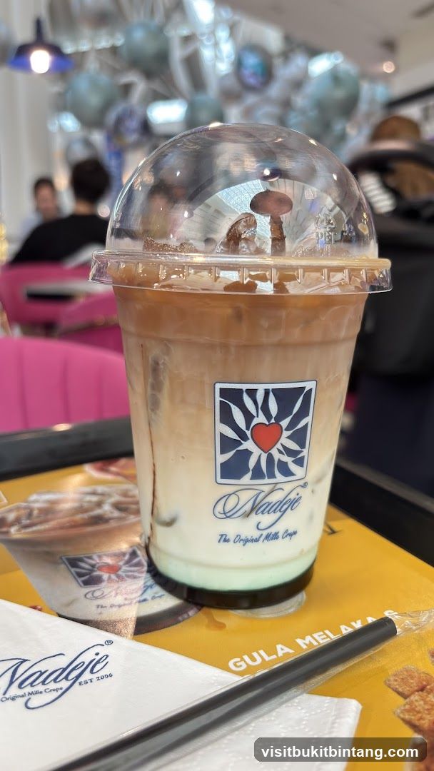 Iced Coffee with Nadeje Logo