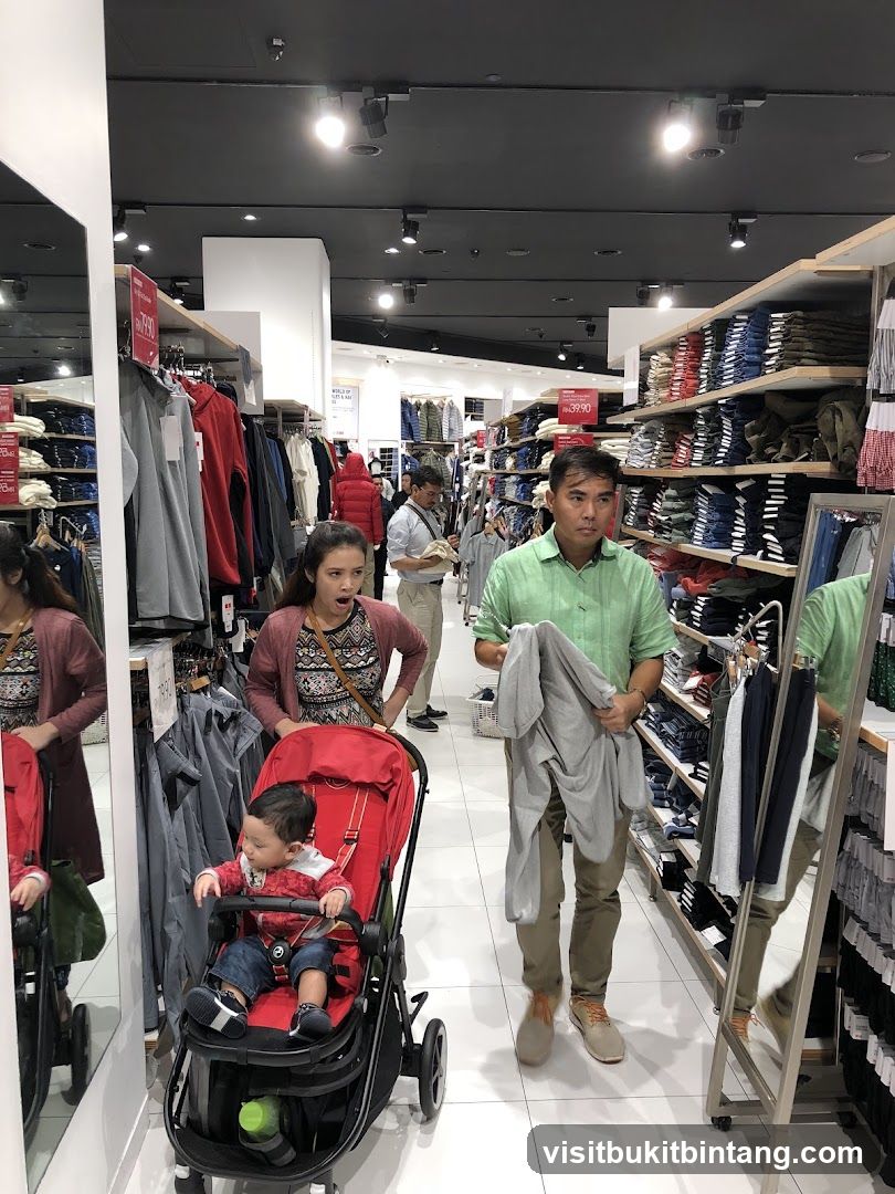 People shopping in a clothing store