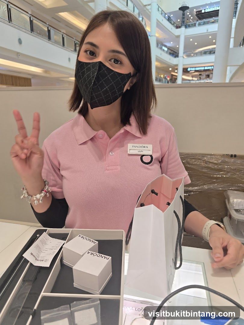 Pandora Employee with Jewelry Boxes