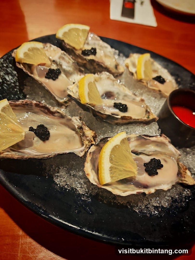 Oysters with Caviar and Lemon