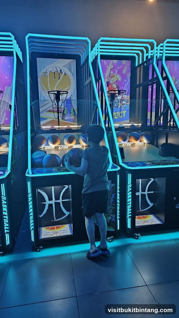 Child playing basketball arcade game
