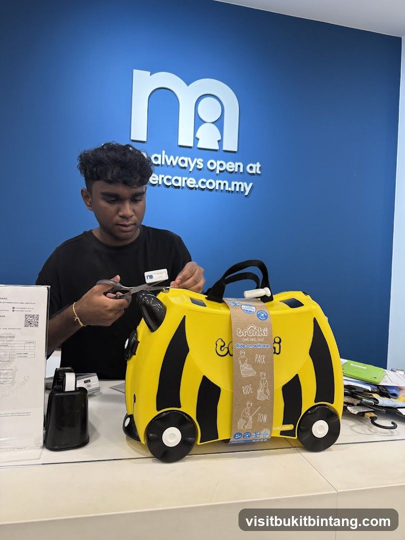 Employee preparing a Trunki suitcase