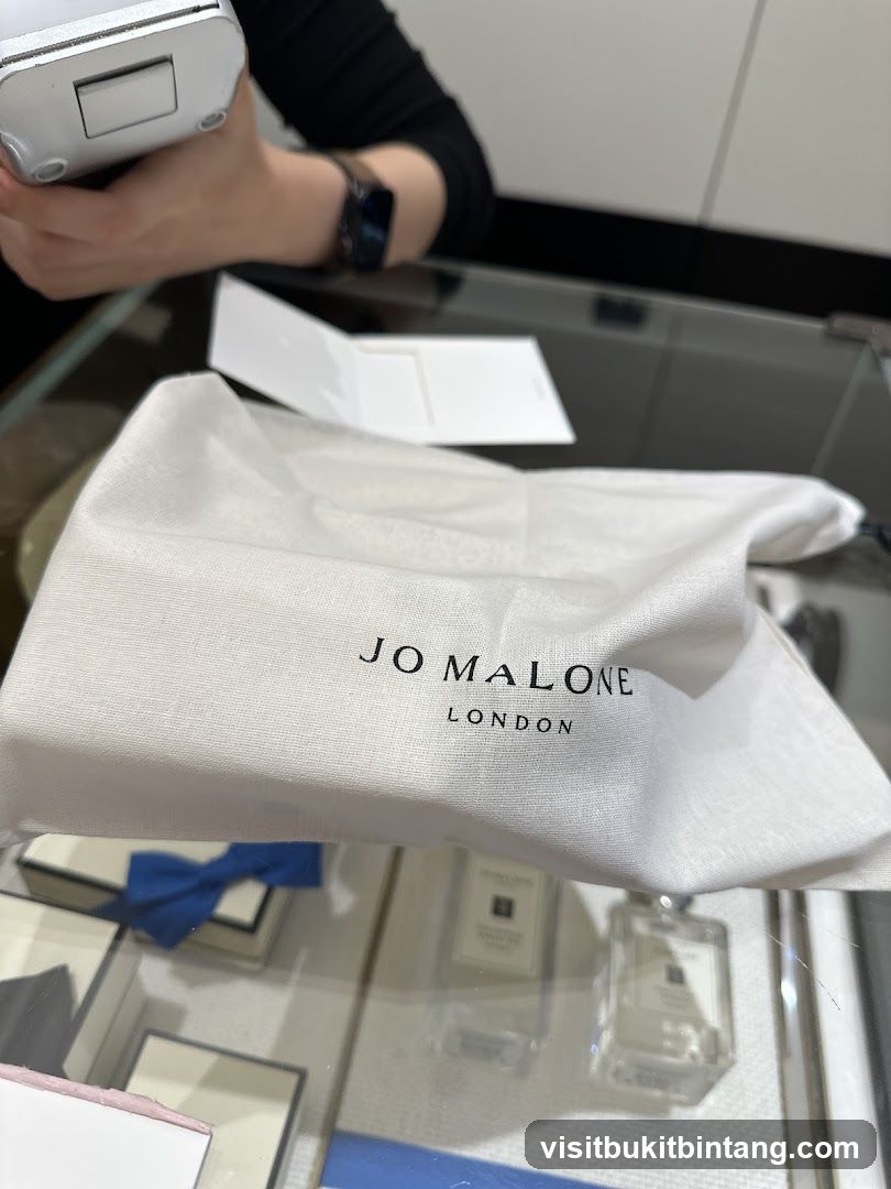 Jo Malone London Shopping Bag and Perfume Bottles