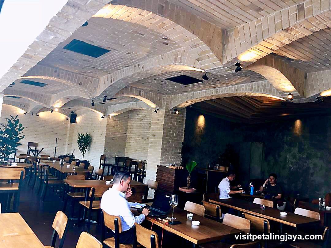 Interior of a brick-arched restaurant or café