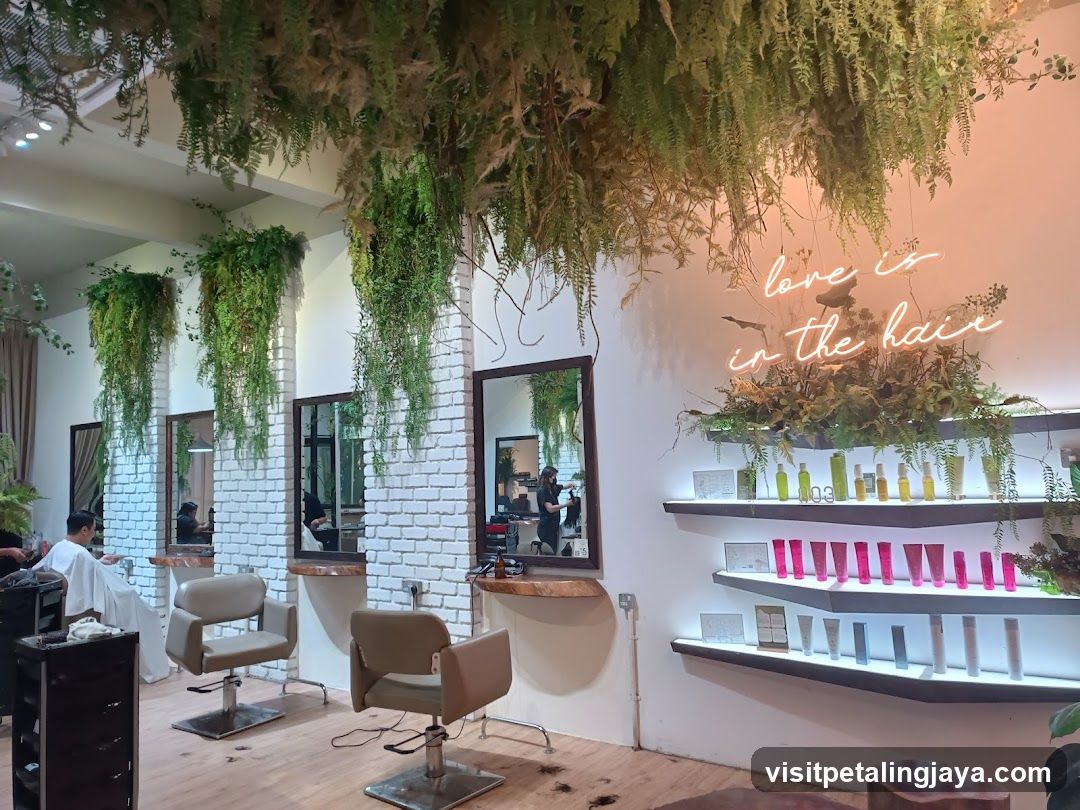 Hair Salon Interior with Greenery and Neon Signage