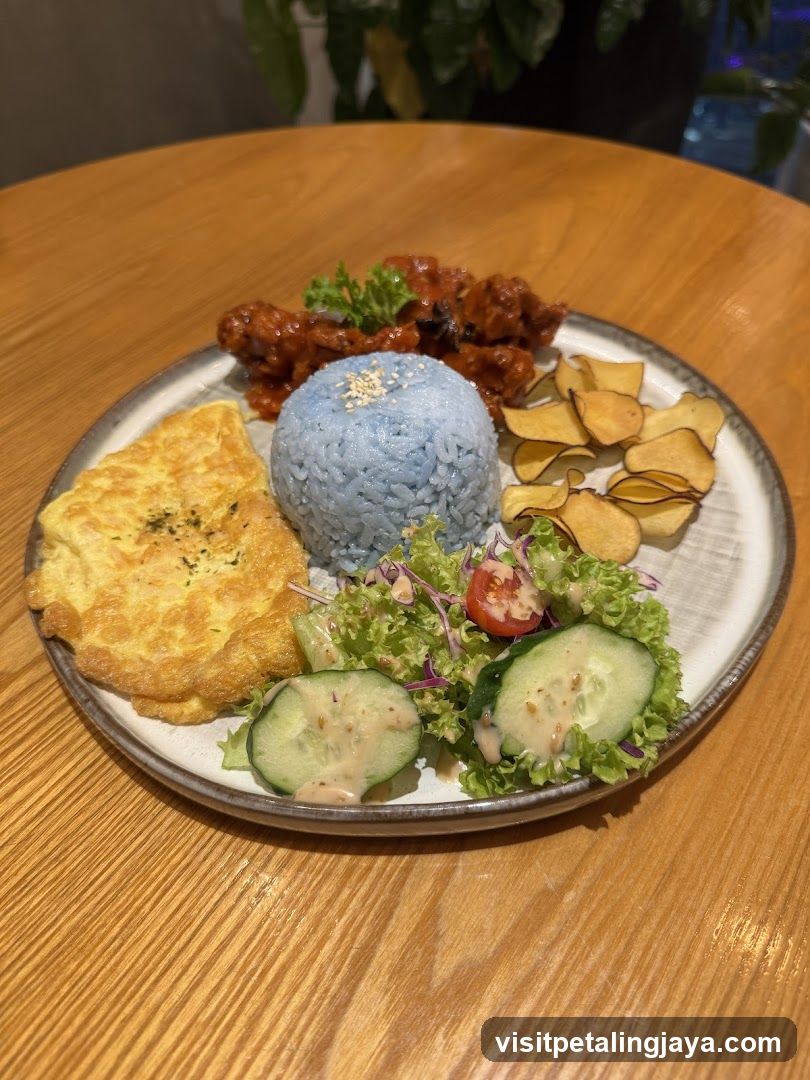 Blue Rice Plate with Omelette and Fried Chicken