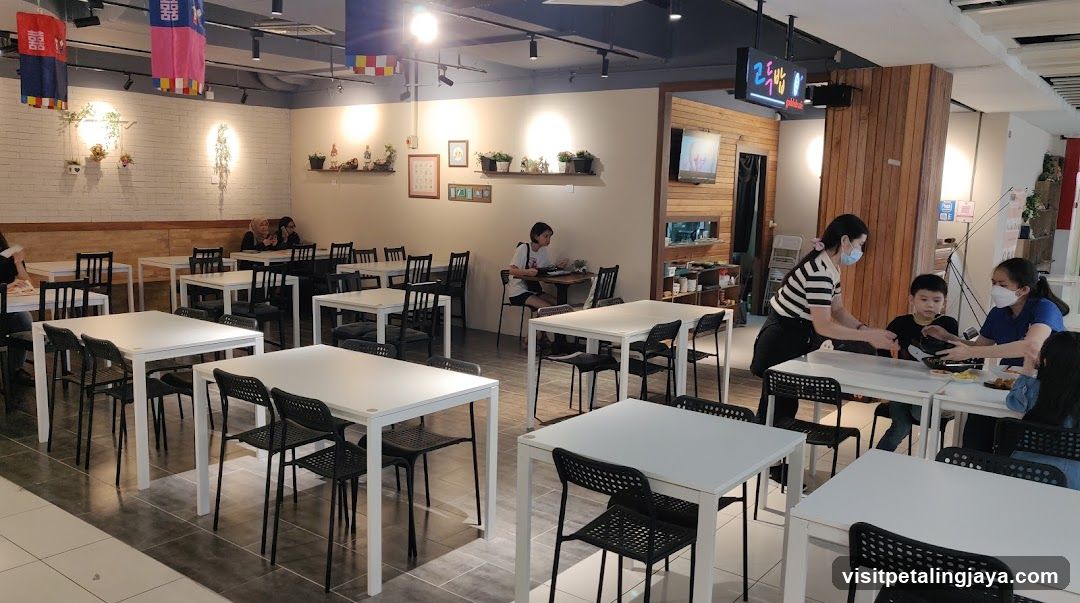 Restaurant Interior with Staff Serving Customers