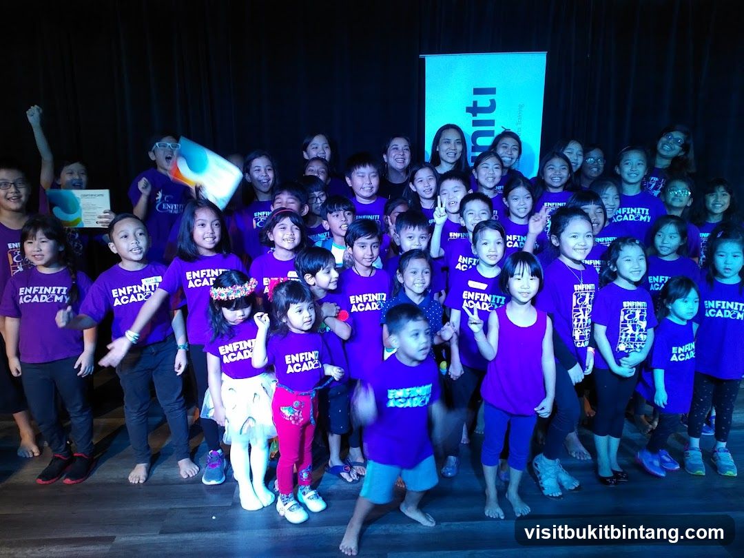 Group of children and adults posing for a photo