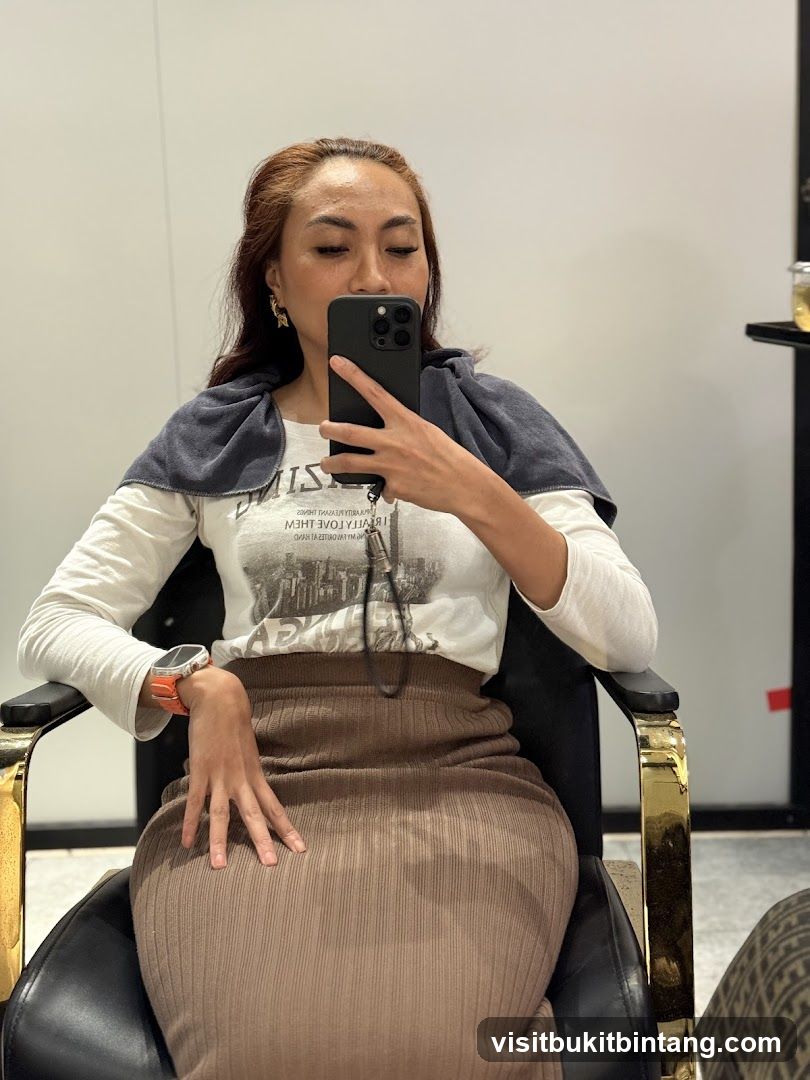 Woman taking a selfie in a salon