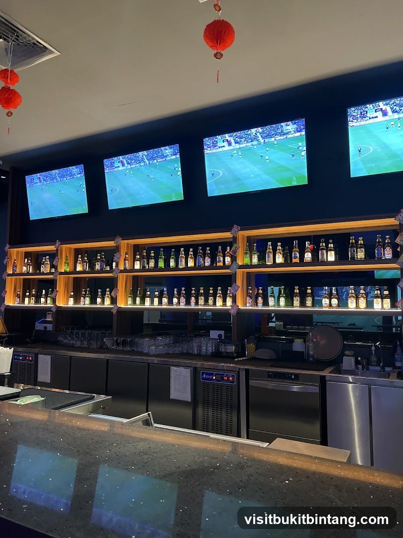 Bar with screens and bottles
