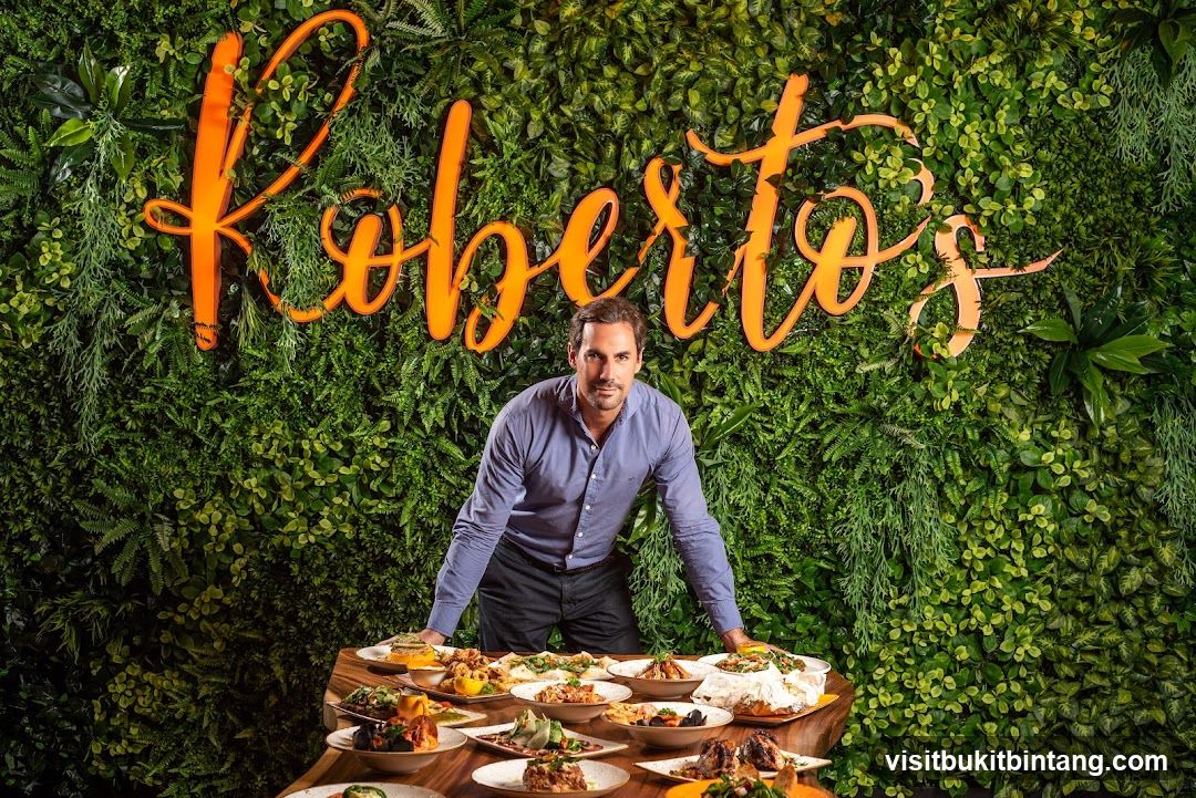 Man with a spread of food