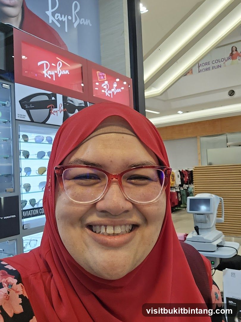 Woman in Red Hijab and Glasses