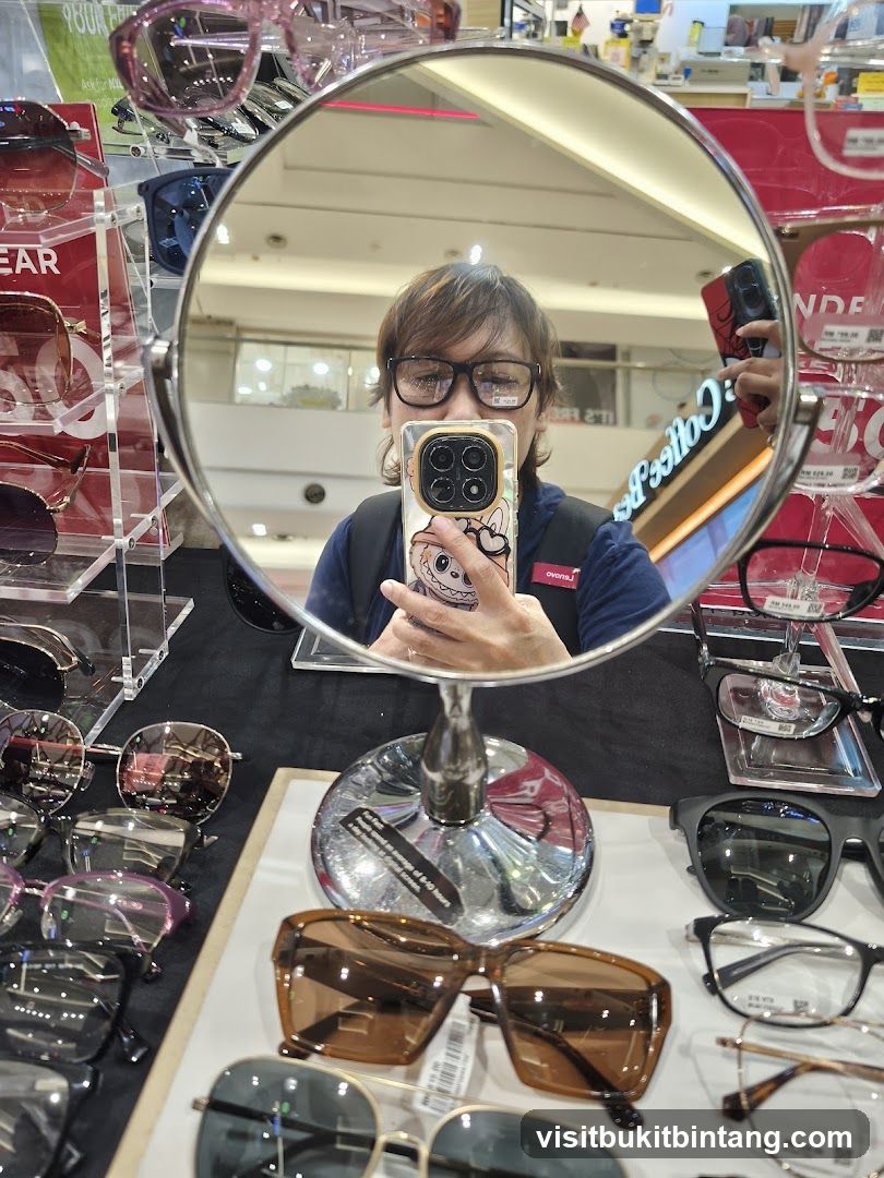 Woman trying on glasses