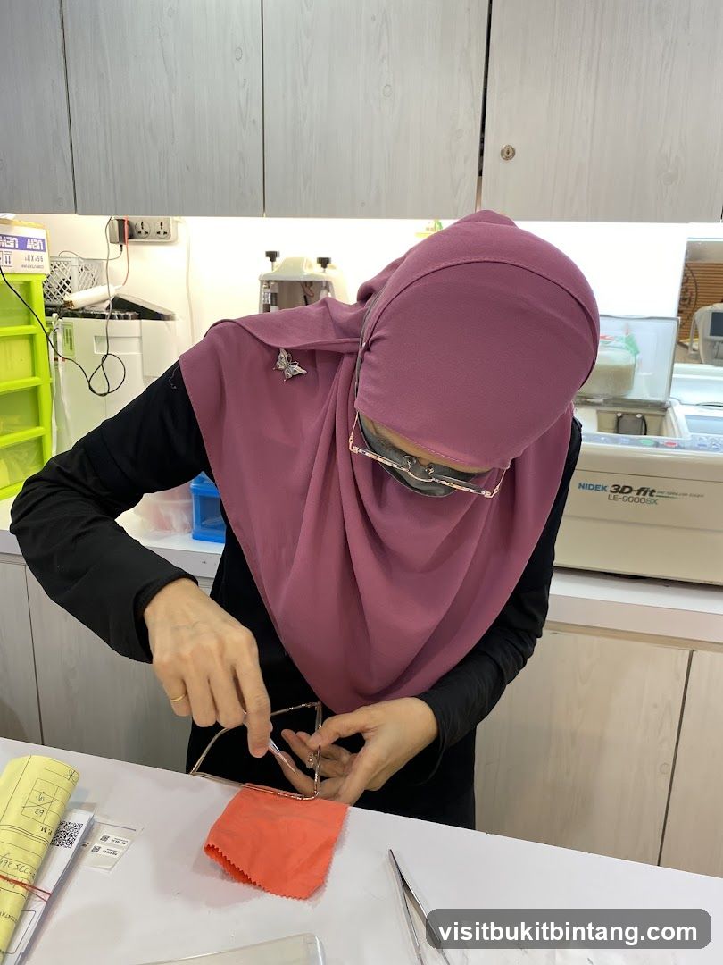 Optician adjusting eyeglasses