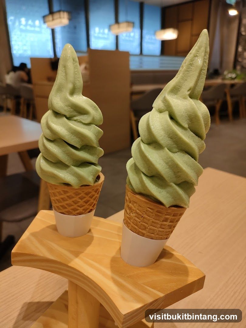 Two Green Soft Serve Ice Creams