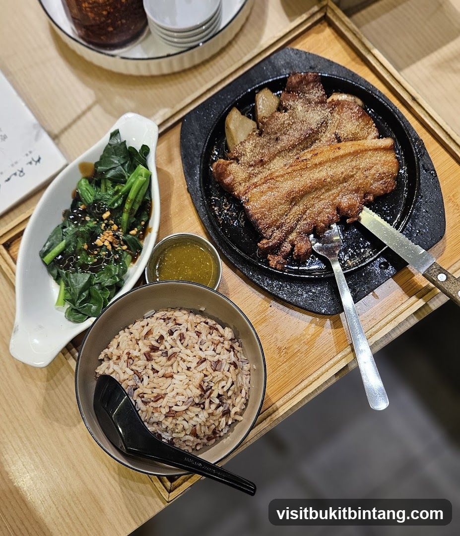 Sizzling Pork Belly with Rice and Greens