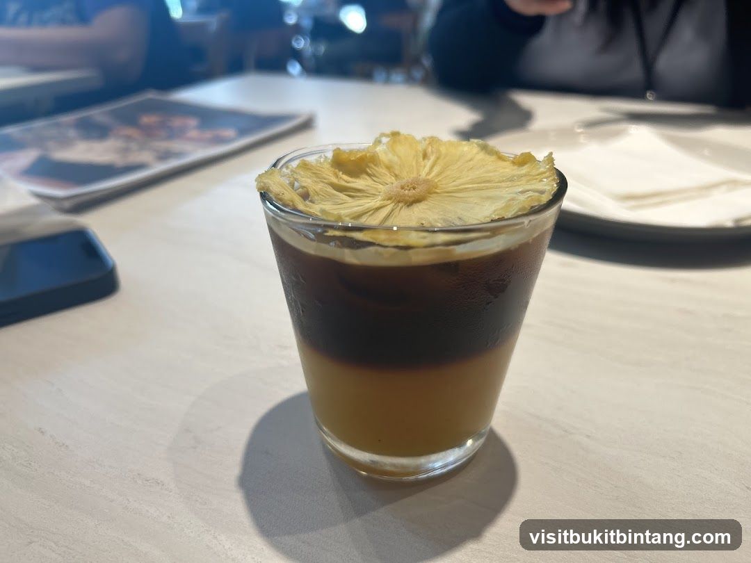 Layered Coffee Drink with Pineapple Garnish