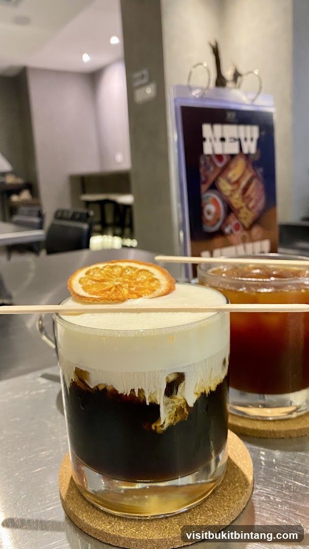 Creamy Coffee Drink with Orange Slice