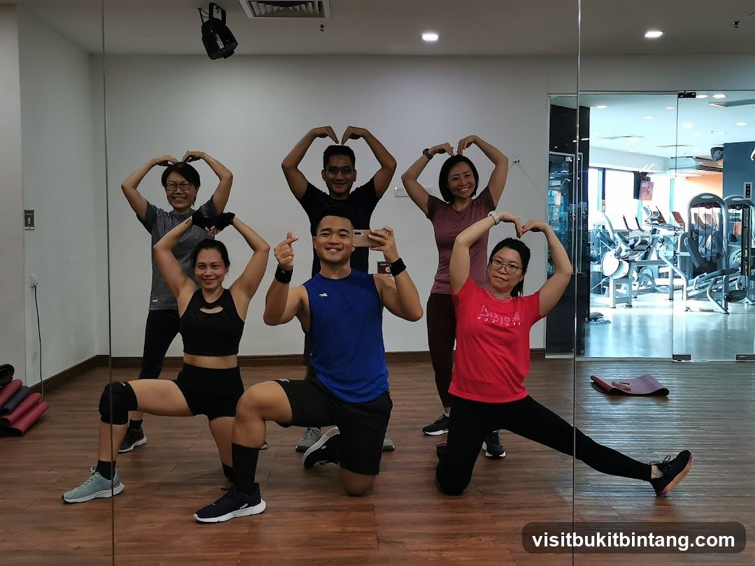 Group posing in a gym