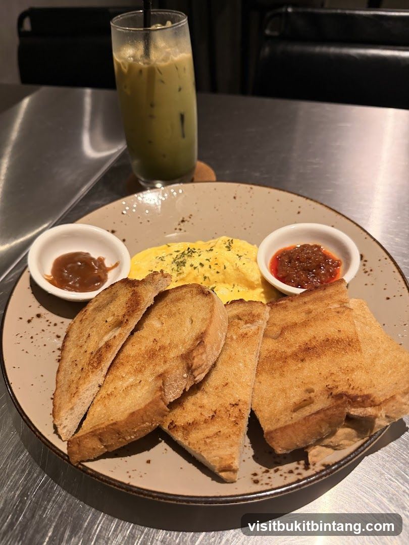 Scrambled Eggs with Toast and Iced Matcha Latte