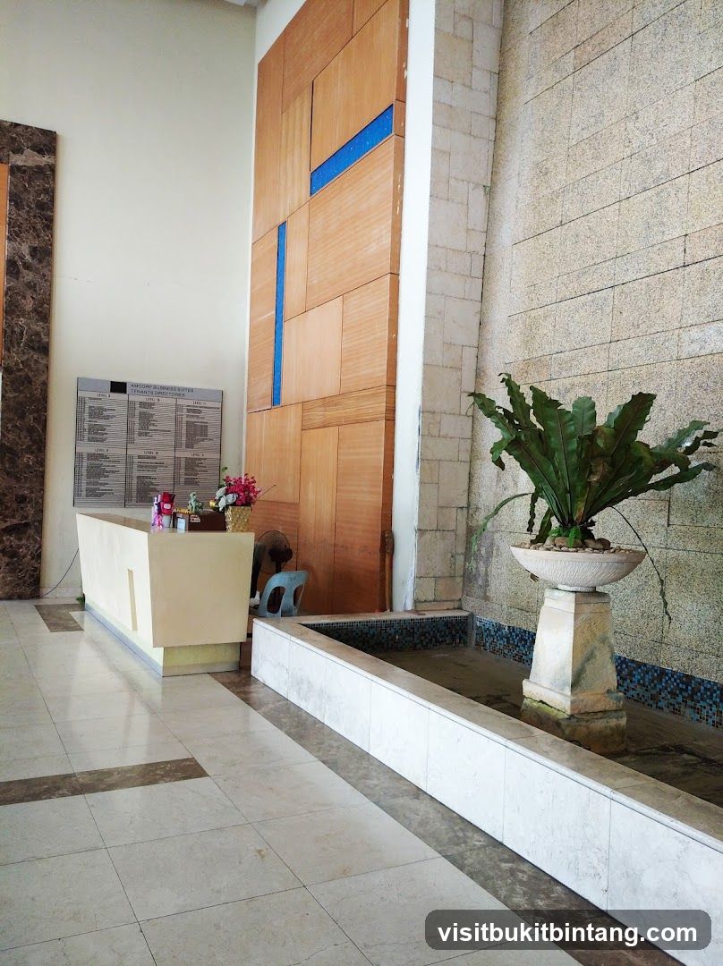 Lobby with reception desk and water feature