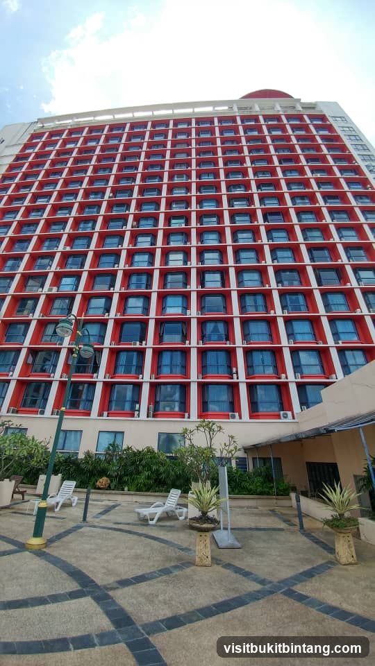 Tall building with red and white facade