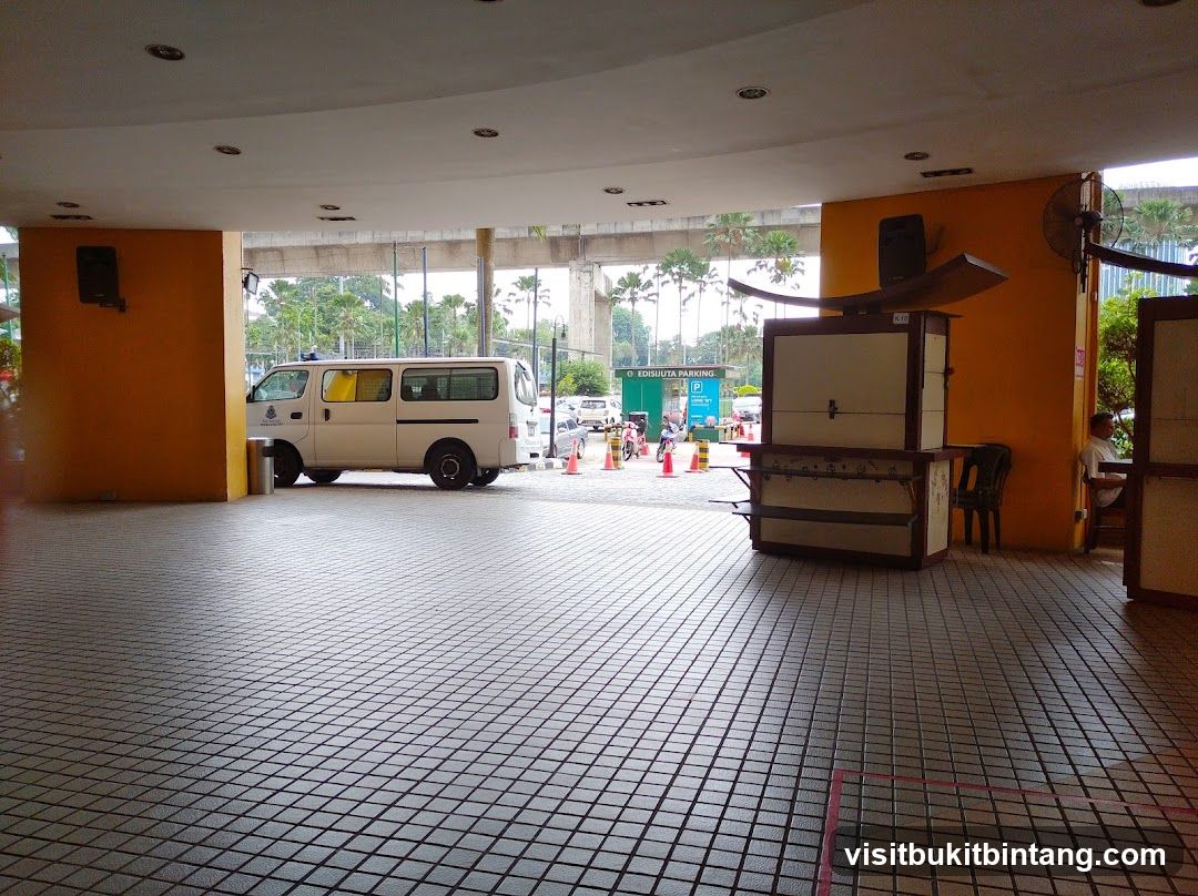 Outdoor area with van and food stall