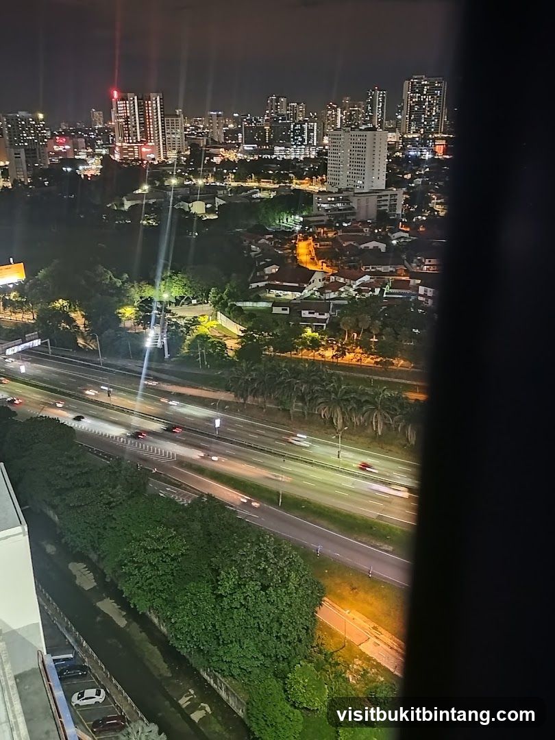 Cityscape at Night with Highway