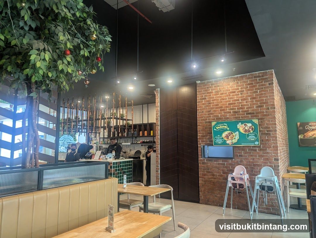 Restaurant Interior with Decorative Tree and Menu Board