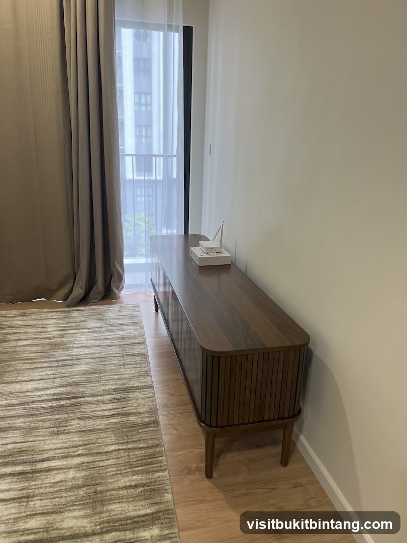 Wooden media console with decorative items