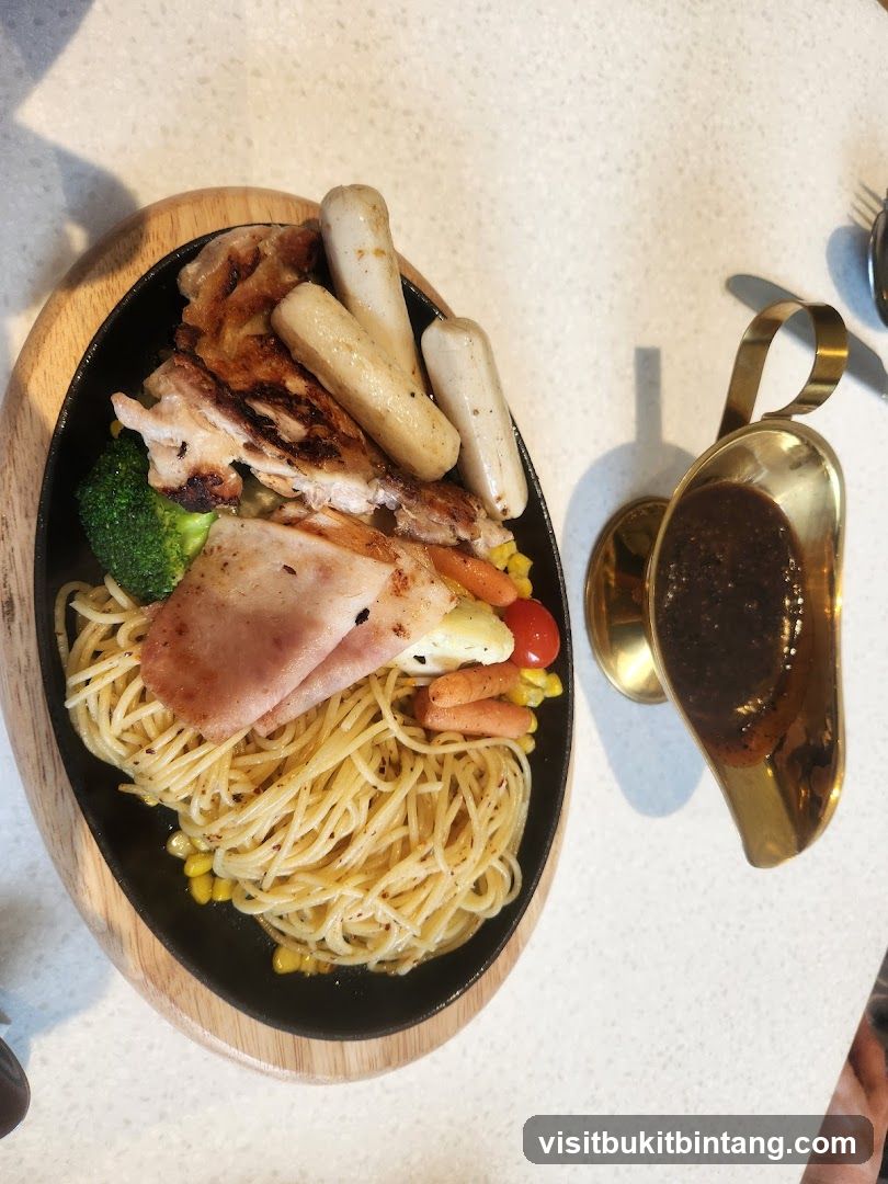 Sizzling Platter with Spaghetti and Grilled Chicken