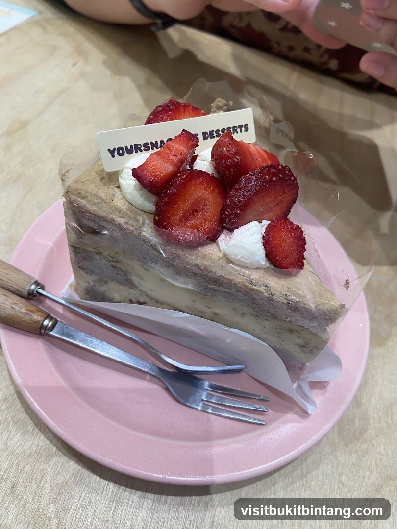 Slice of cake with strawberries